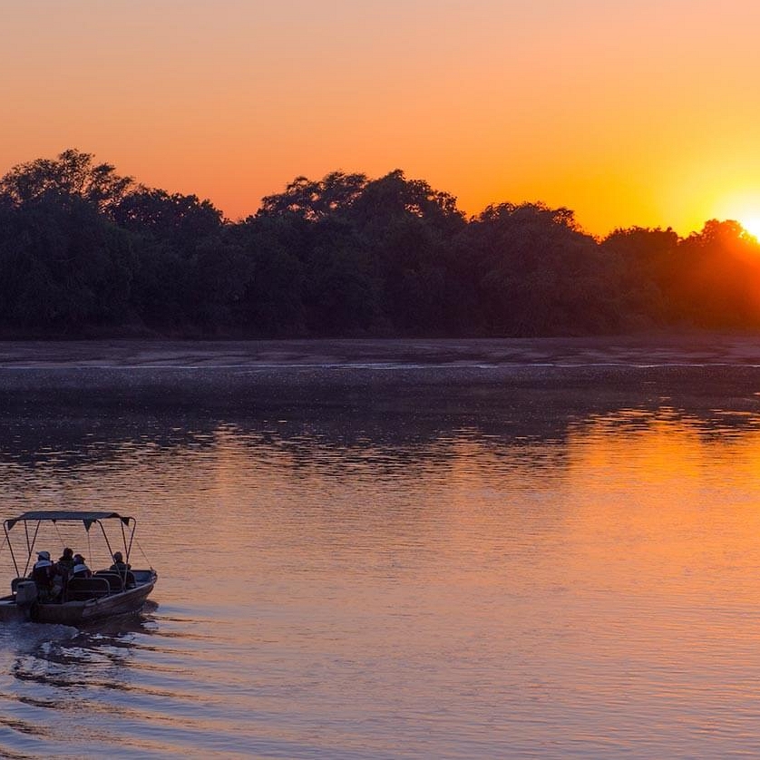 Sunset Cruise at Nkwali Camp, South Luangwa National Park - South Luangwa, Mana Pools, and Victoria Falls Adventure Package
