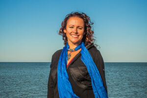 Corinne Goodman on the shore of Lake Michigan