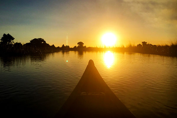 Botswana Safari - Katie Marta - Okavango Delta Mokoro Safari at Sunset