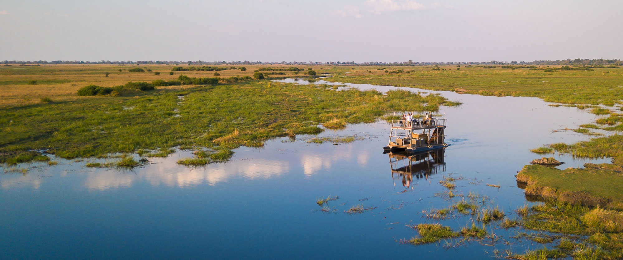 Linyanti River sunset cruise at Kings Pool Camp, Botswana