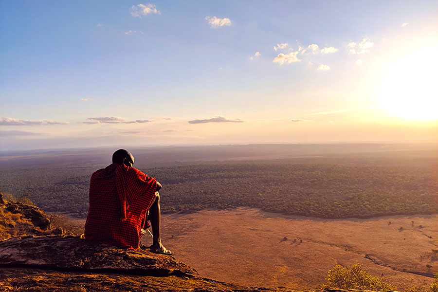 Chyulu Hills, Kenya - Maasai Warrior at Campi ya Kanzi - Image by Candice Heckel